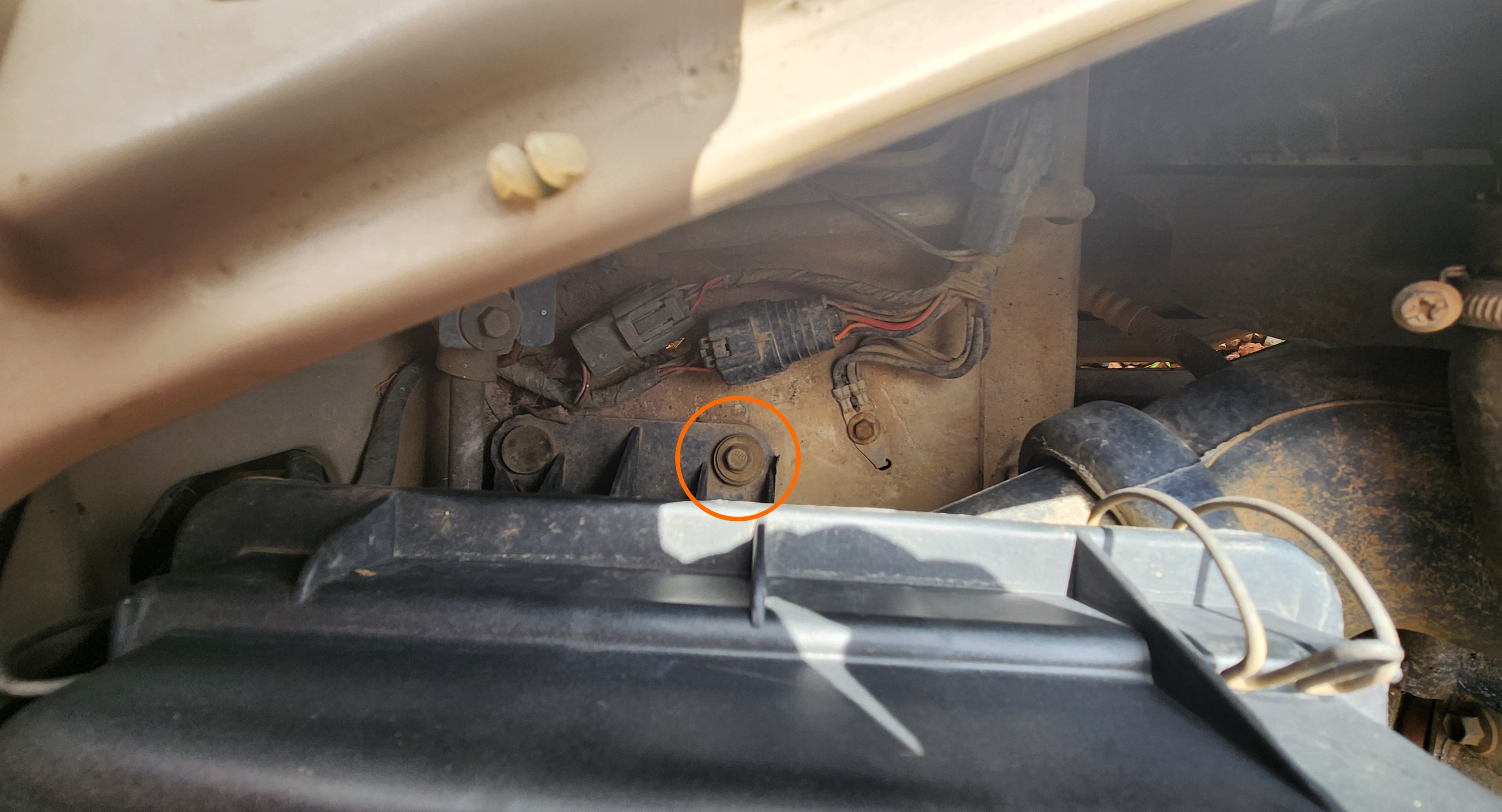 Airbox lower bolt location