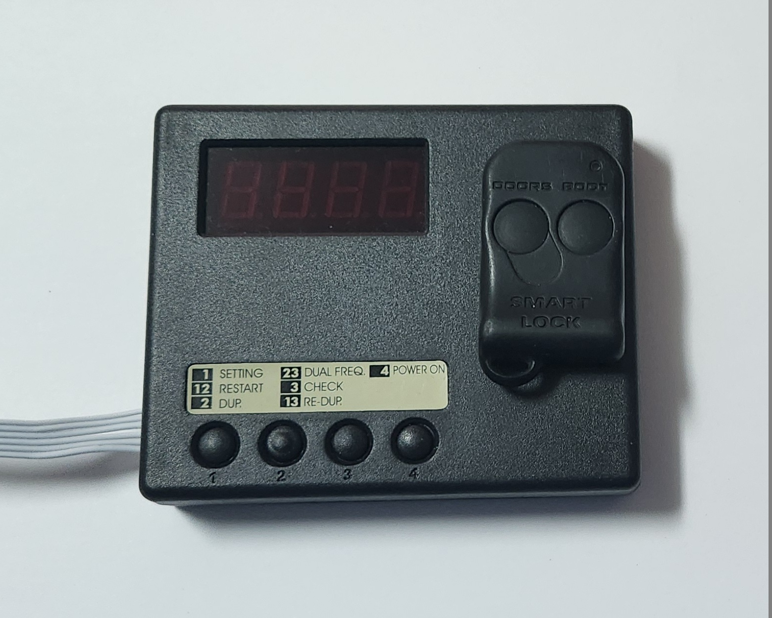 Picture of OEM Remote on programming area of Remocon-888