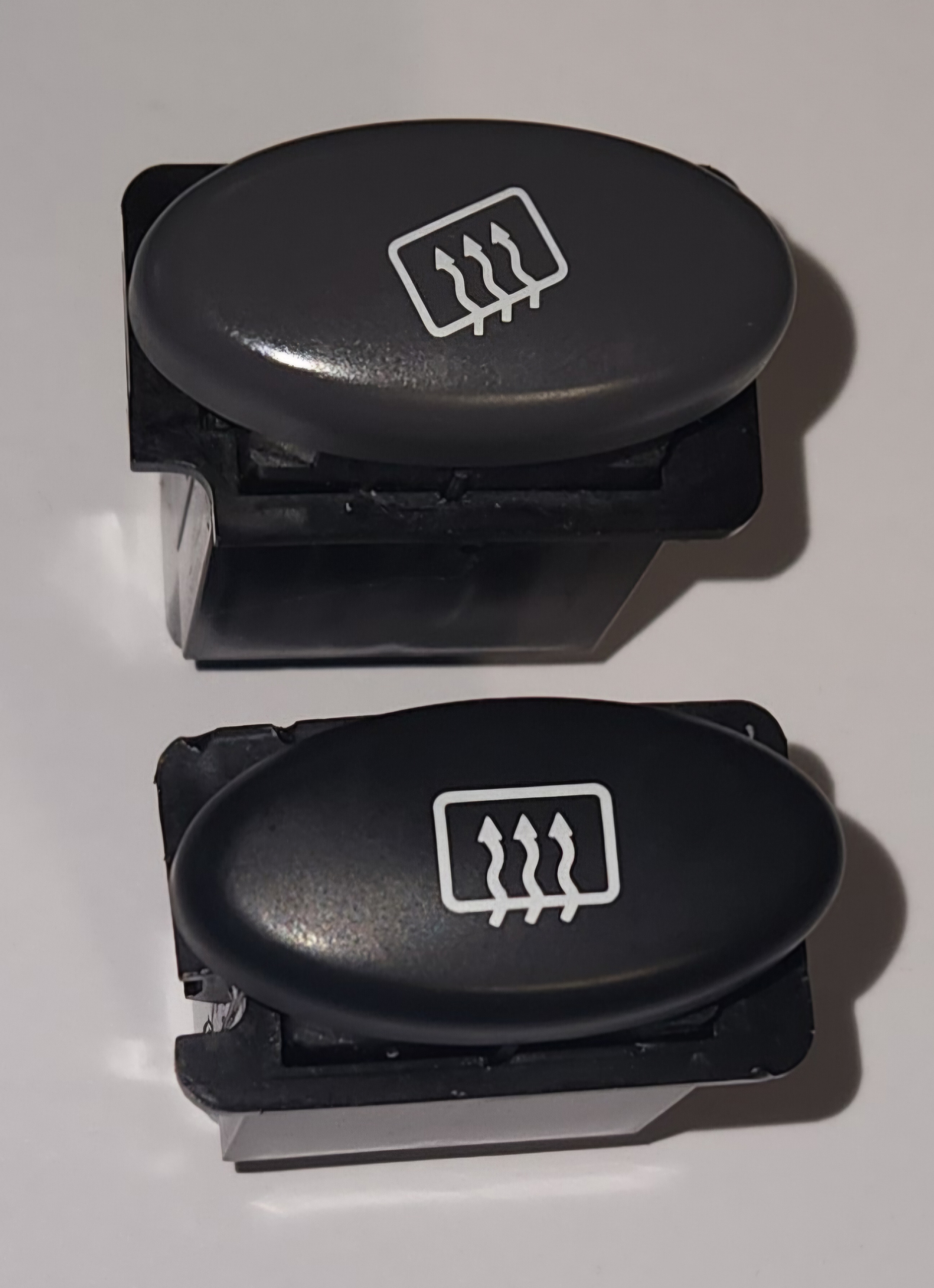 Demister Button Comparison